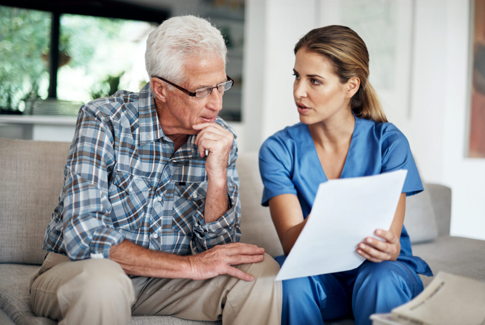 Senior man consulting with healthcare professional