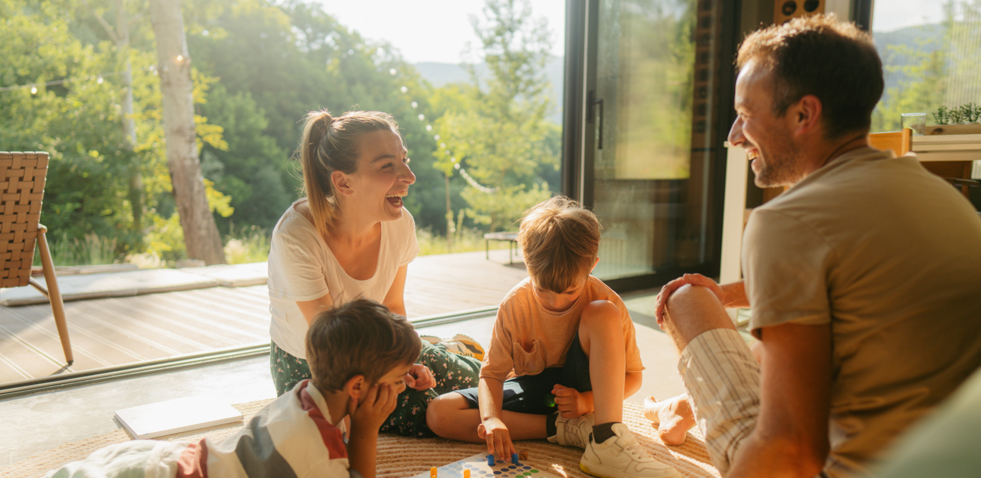Happy family bonding over board game