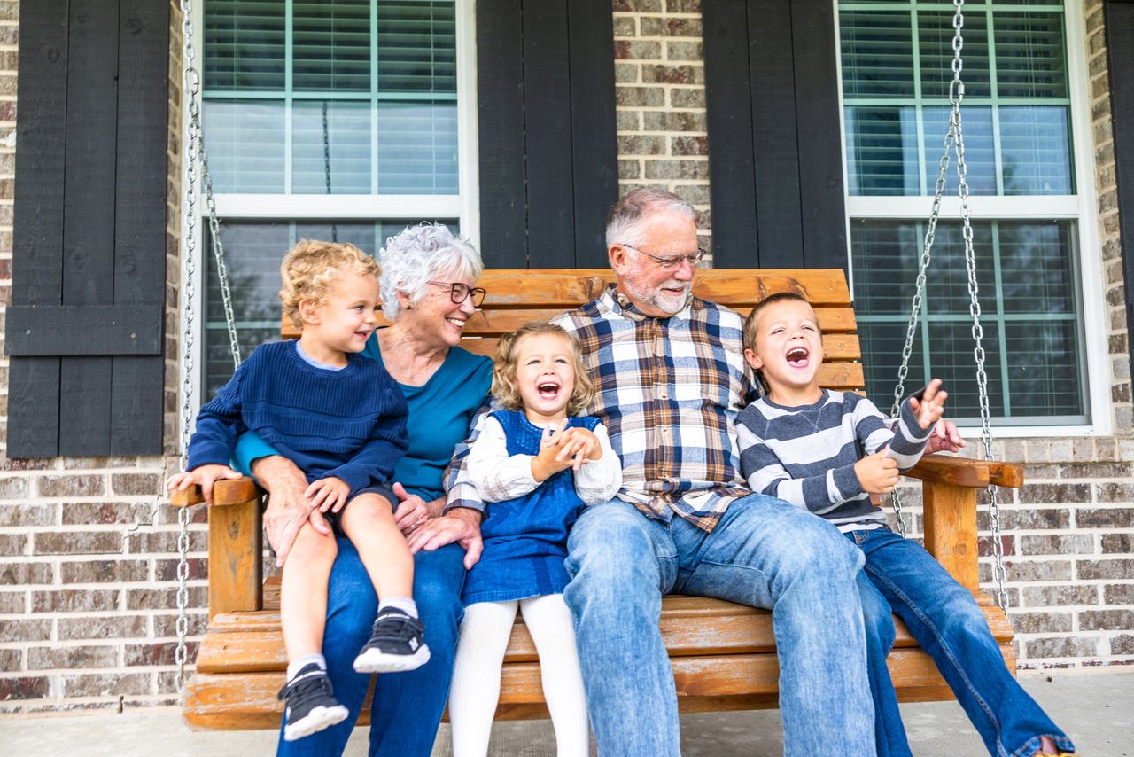 Happy family enjoying porch time