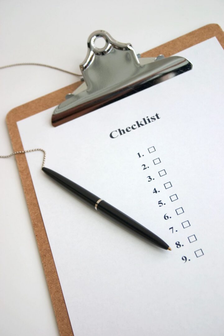 Blank checklist and pen on board